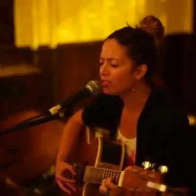 Picture of Irene Molloy during a stage performance.